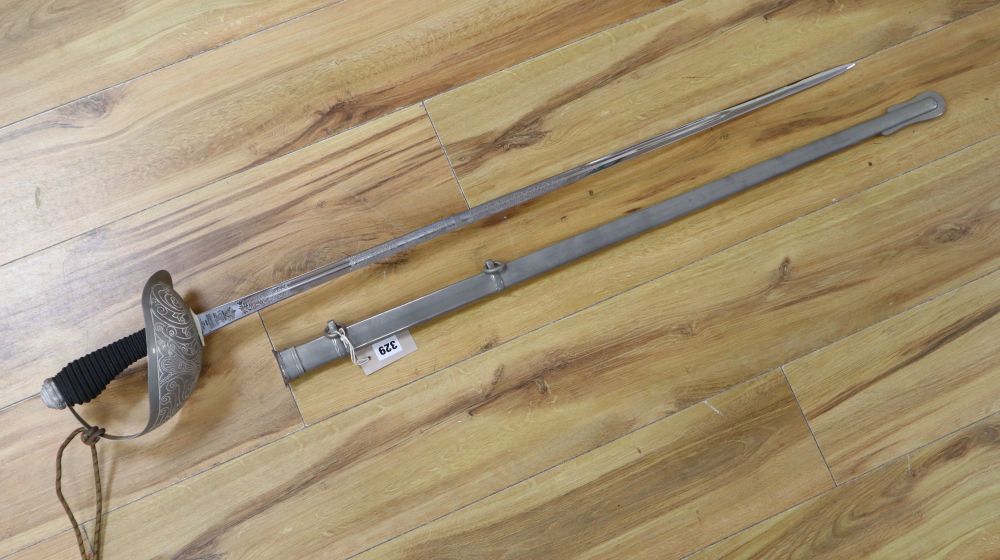An officers sword, shagreen grip and 88cm etched, single-edged blade, in scabbard